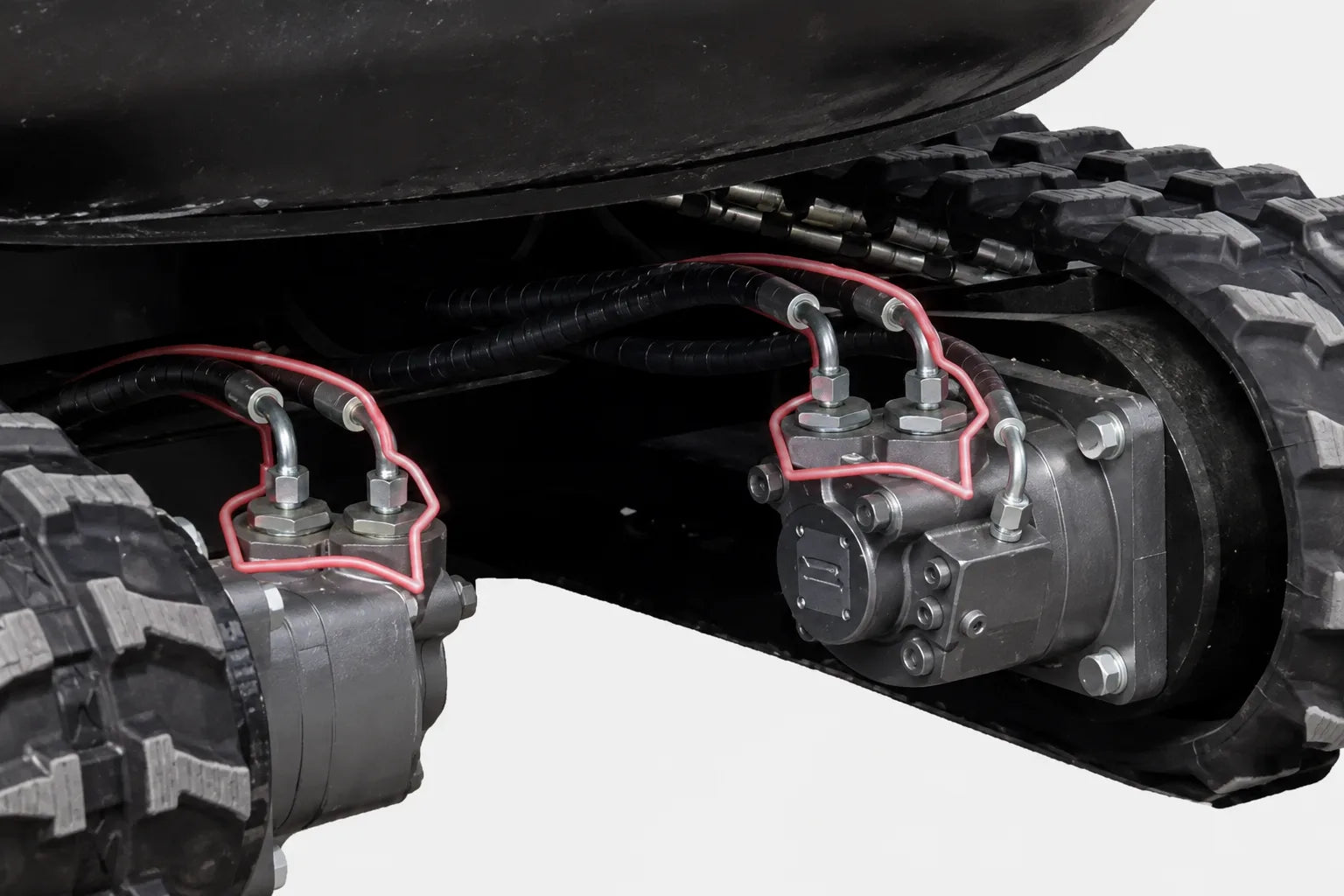 Oil drain pipes on TYPHON TERROR XVIII mini excavator